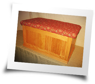 Fine upholstered oak storage chest made by Silver Creek Woodcrafters, LLC.