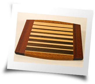 Breadboard made with Bloodwood, Lacewood, hickory, and black walnut