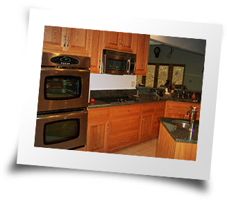 Skillfully crafted red oak kitchen by Ken Yeager